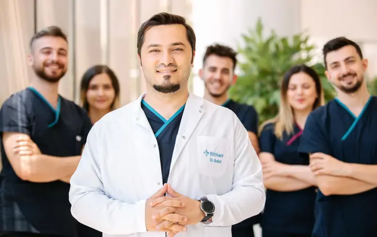 Dr. Balwi with the Elithair medical team in the clinic's lobby