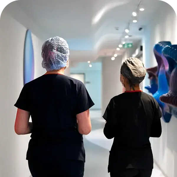 Interior corridor of Elit Clinic treatment area showing clean, modern medical facilities and patient rooms