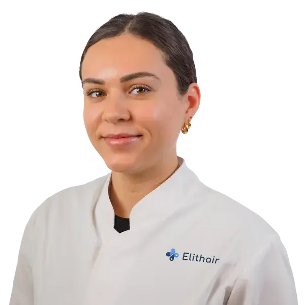 Elithair consultant providing information and guidance to a patient about hair transplant options and treatment process