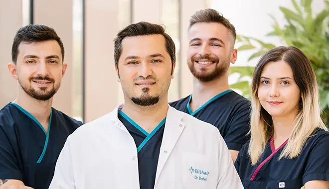 The Elithair medical team with Dr. Balwi smiling